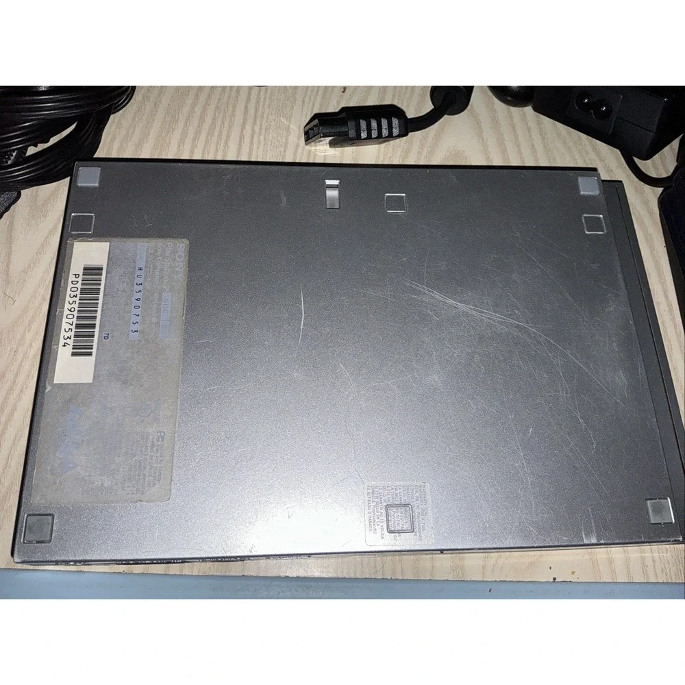 playstation 2 console,‎ 1 Wireless Controller 1 Reg Controller ,5 Games